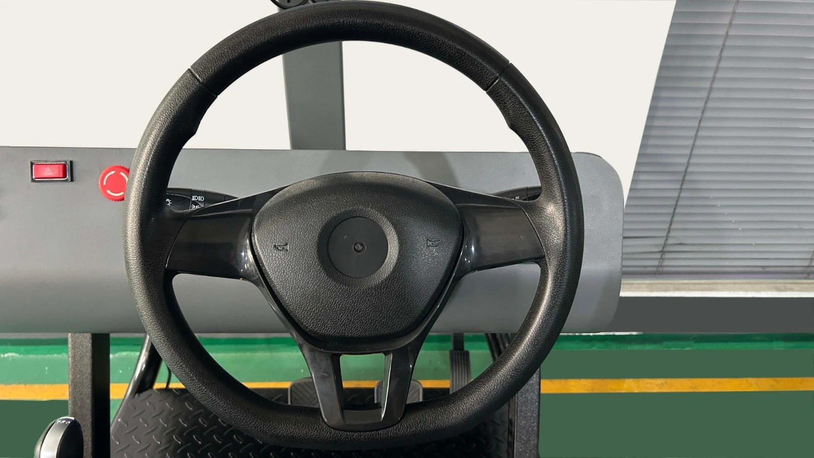 Steering wheel and driver control area